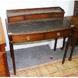 An Edwardian mahogany writing table with three drawer superstructure,