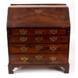 A George III mahogany bureau, circa 1760,