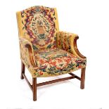 A George III style Gainsborough type armchair with needlework upholstered back,