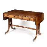 A Regency mahogany two-flap table in the manner of Gillows, banded in ebony,