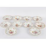 A set of ten Dresden flower-decorated plates with gilt rims, circa 1870, blue printed marks,