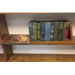 A group of 1950s books with decorative bindings,