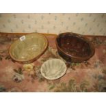 A collection of three 19th century stoneware jelly moulds.