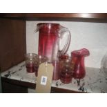 A Cranberry glass jug, other Cranberry glass. (qty)
