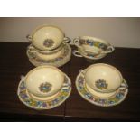 Crown Ducal embossed fruit pattern twin handled soup bowls