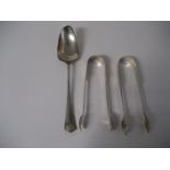 An 18th century silver table spoon (marks rubbed) together with two silver sugar tongs (3), 4.9oz.