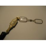 A pair of late 19th folding spectacles.