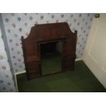 An oak over mantle mirror.