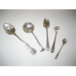 A Chester silver tea strainer with scroll terminal, 4 silver spoons (5), 2.1oz.