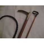 A silver collar riding crop with another (2)
