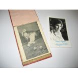 An autograph book together with a signed photograph of Angela Ripon.