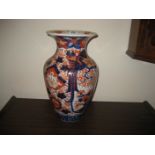 A large early 20th century Imari pattern vase