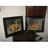 A pair of ebonised framed still life fruit pictures