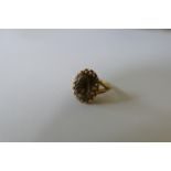 A 9ct gold ring (4.3g all in).