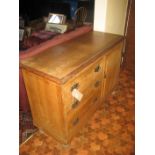 An early 20th century pine sideboard.