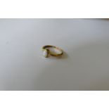 A 9ct gold white stone ring, (1.7g all in).