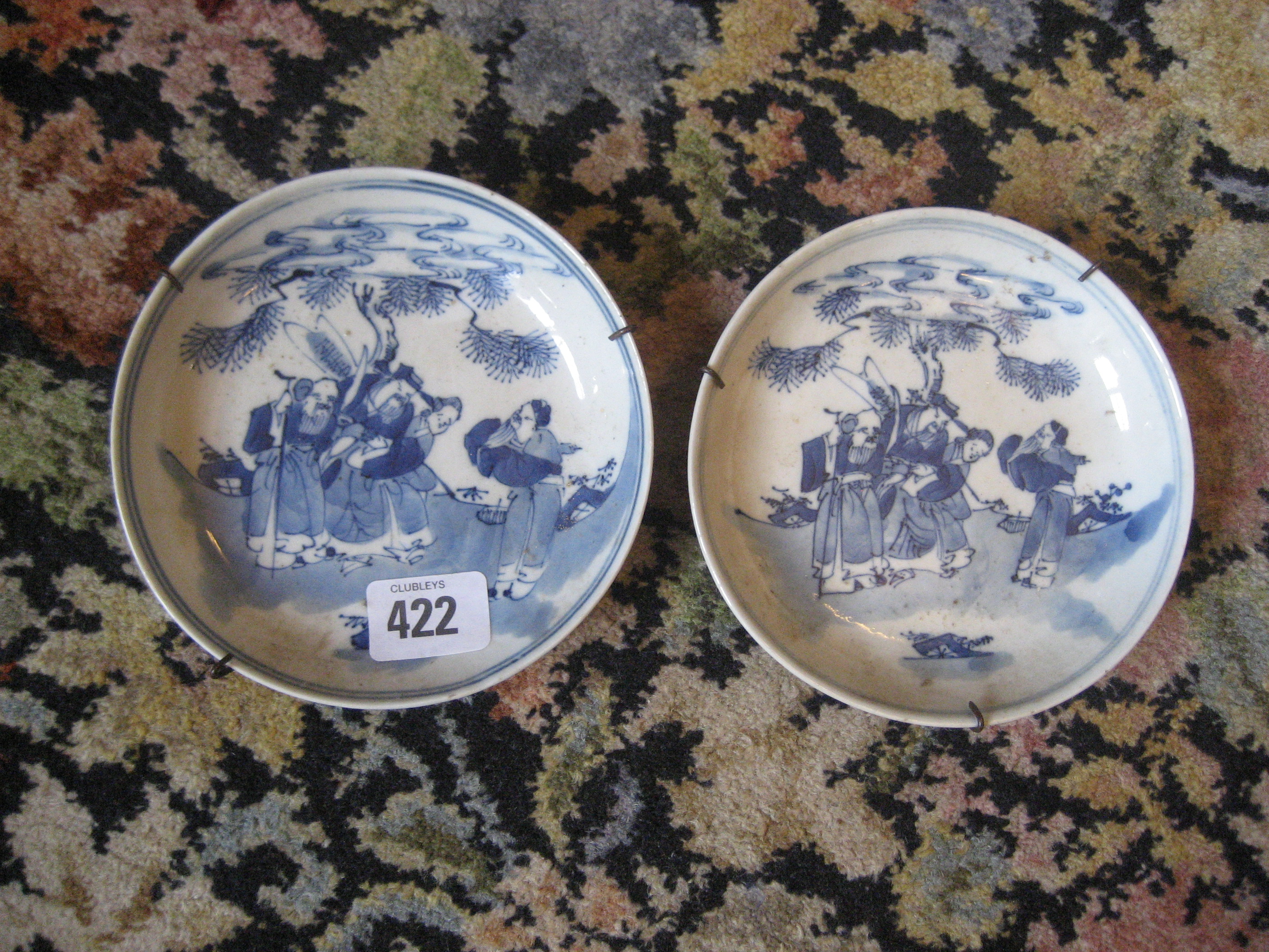 A pair of 19th century chinese blue and white side plates.