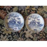A pair of 19th century chinese blue and white side plates.