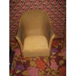 A Lloyd Loom chair.