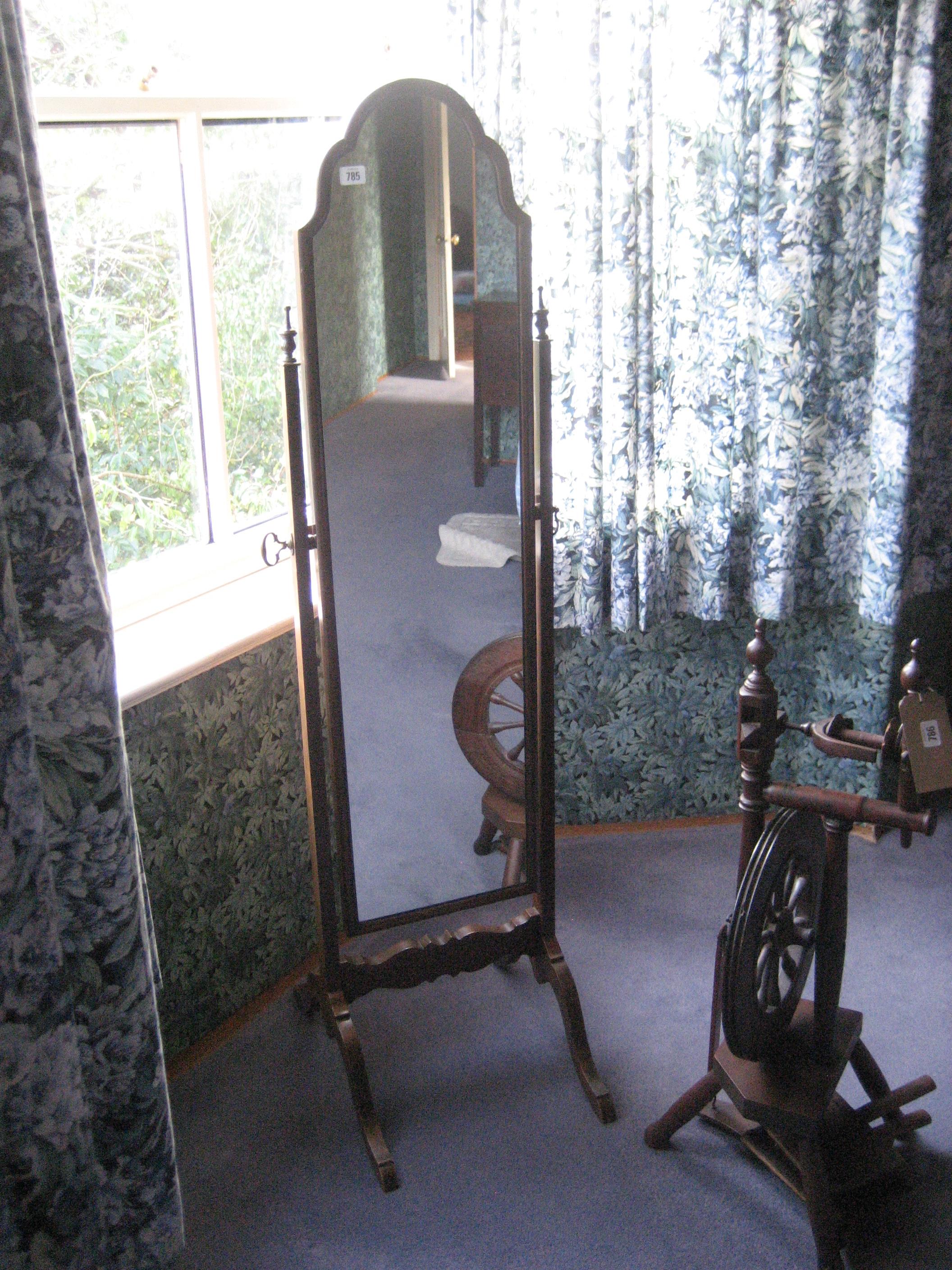 A 20th century cheval mirror.