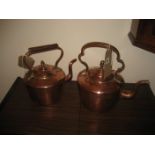 A 19th century copper kettle with another (2)