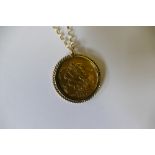 A Victorian 1901 full gold sovereign with yellow metal mount, on a 9ct gold chain (12.4g all in).
