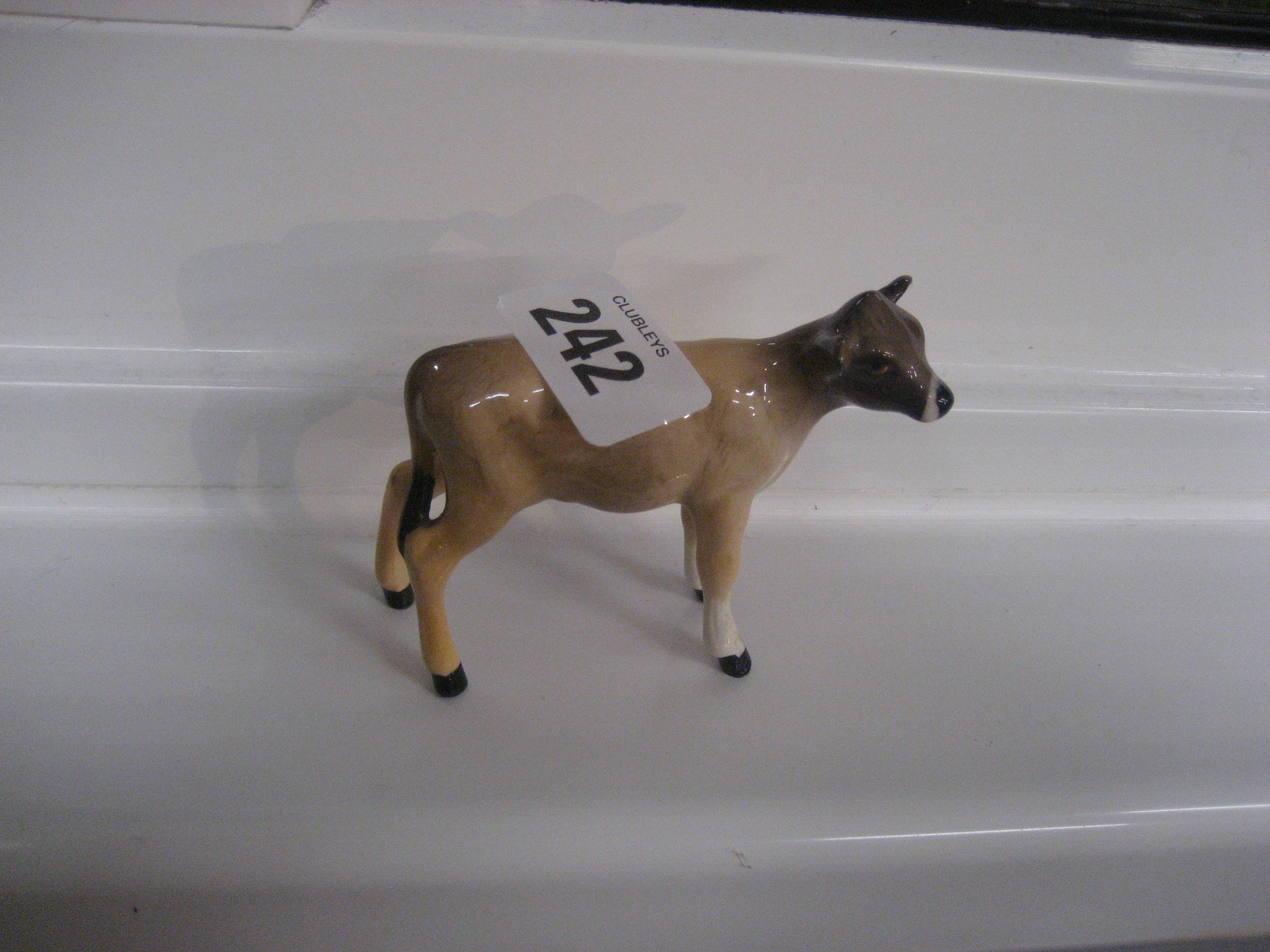 A Beswick Jersey calf.