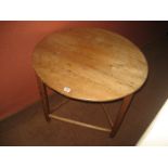 A pine cricket table.