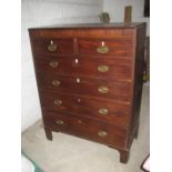A George III oak chest of drawers.