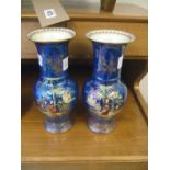 A pair of blue ground Carltonware lustre vases (a/f).