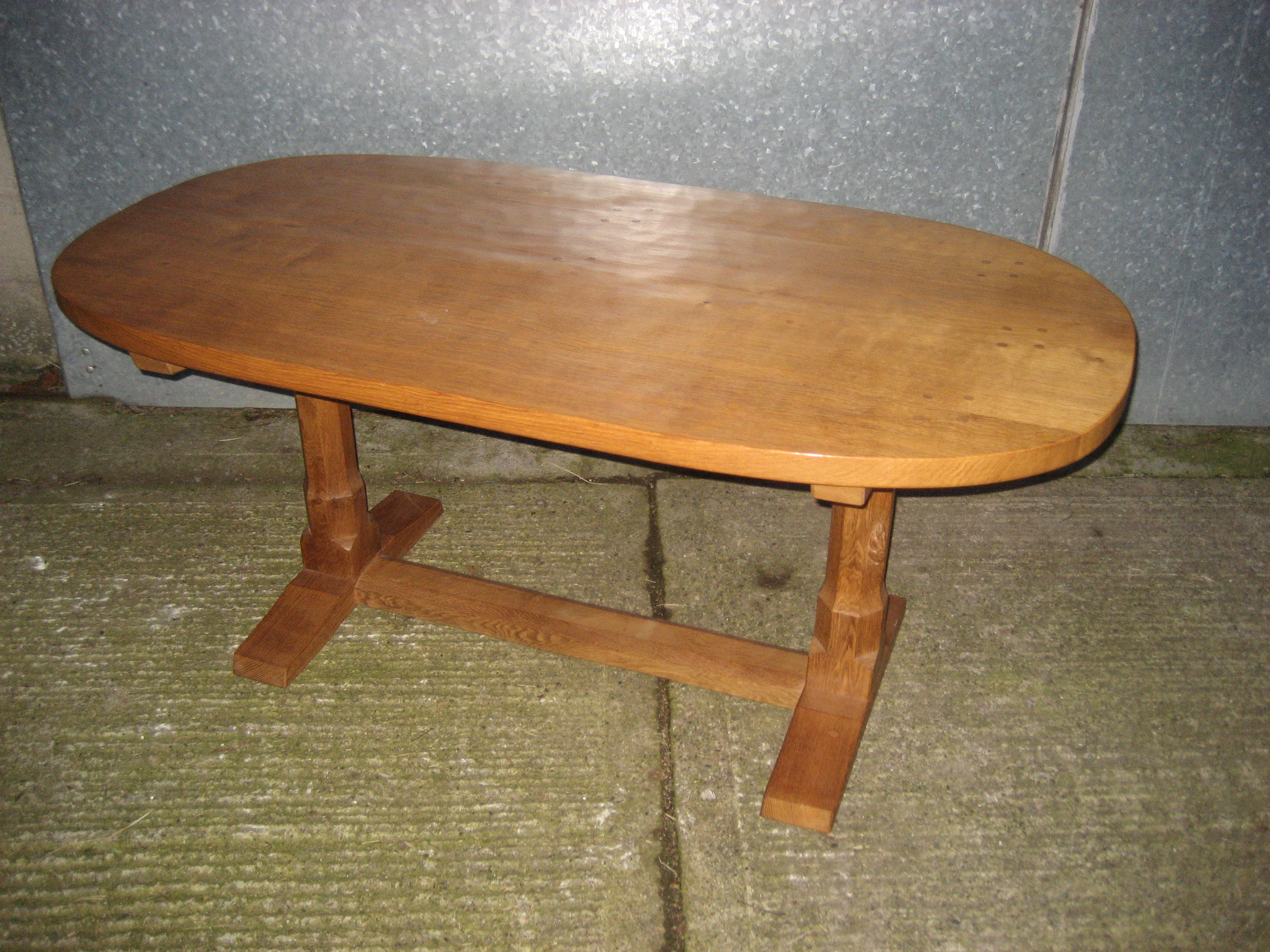 A Peter Heap oak dining table of oval from with large signature rabbit to one leg. Adzed top. - Image 5 of 5