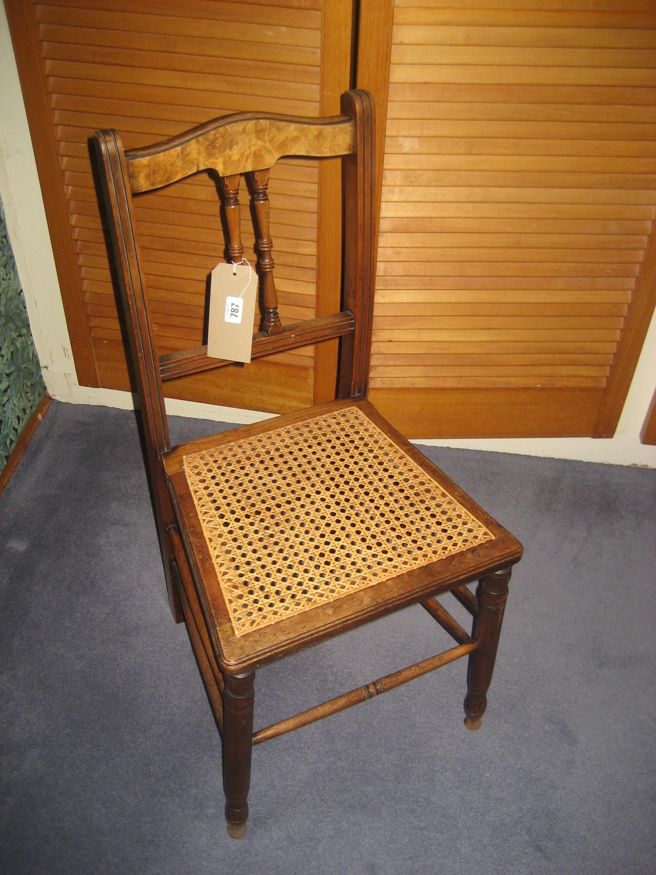 An Edwardian cane seat bedroom chair.