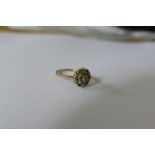 A 9ct gold emerald and paste diamond ring, 2.9g (all in).