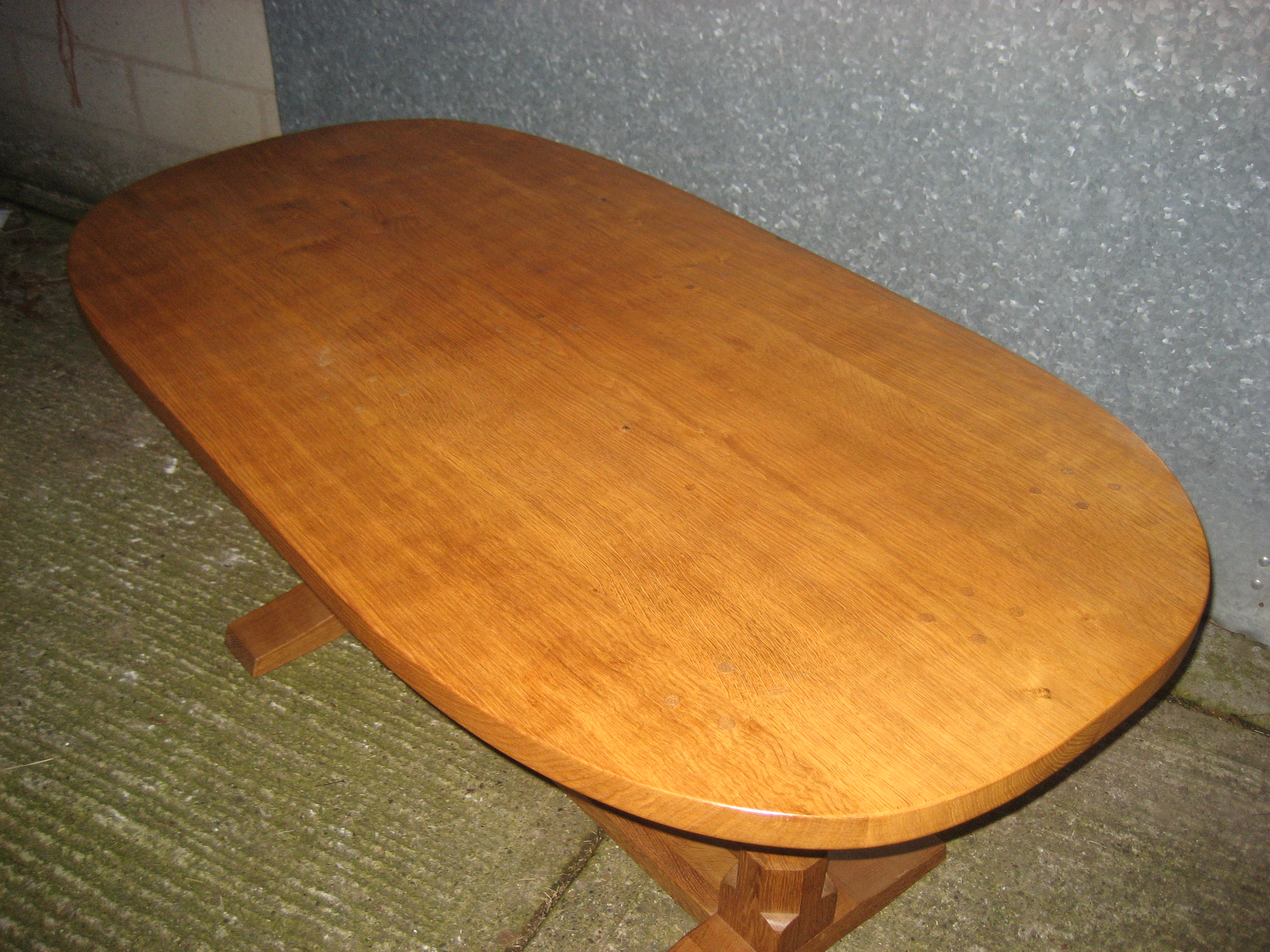 A Peter Heap oak dining table of oval from with large signature rabbit to one leg. Adzed top. - Image 4 of 5