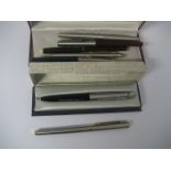 A Parker fountain pen together with others (contents of 1 bag).