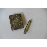An early 20th silver needle cover and a mother of pearl fruit knife (2).