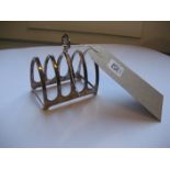 A silver toast rack. 1.9oz.