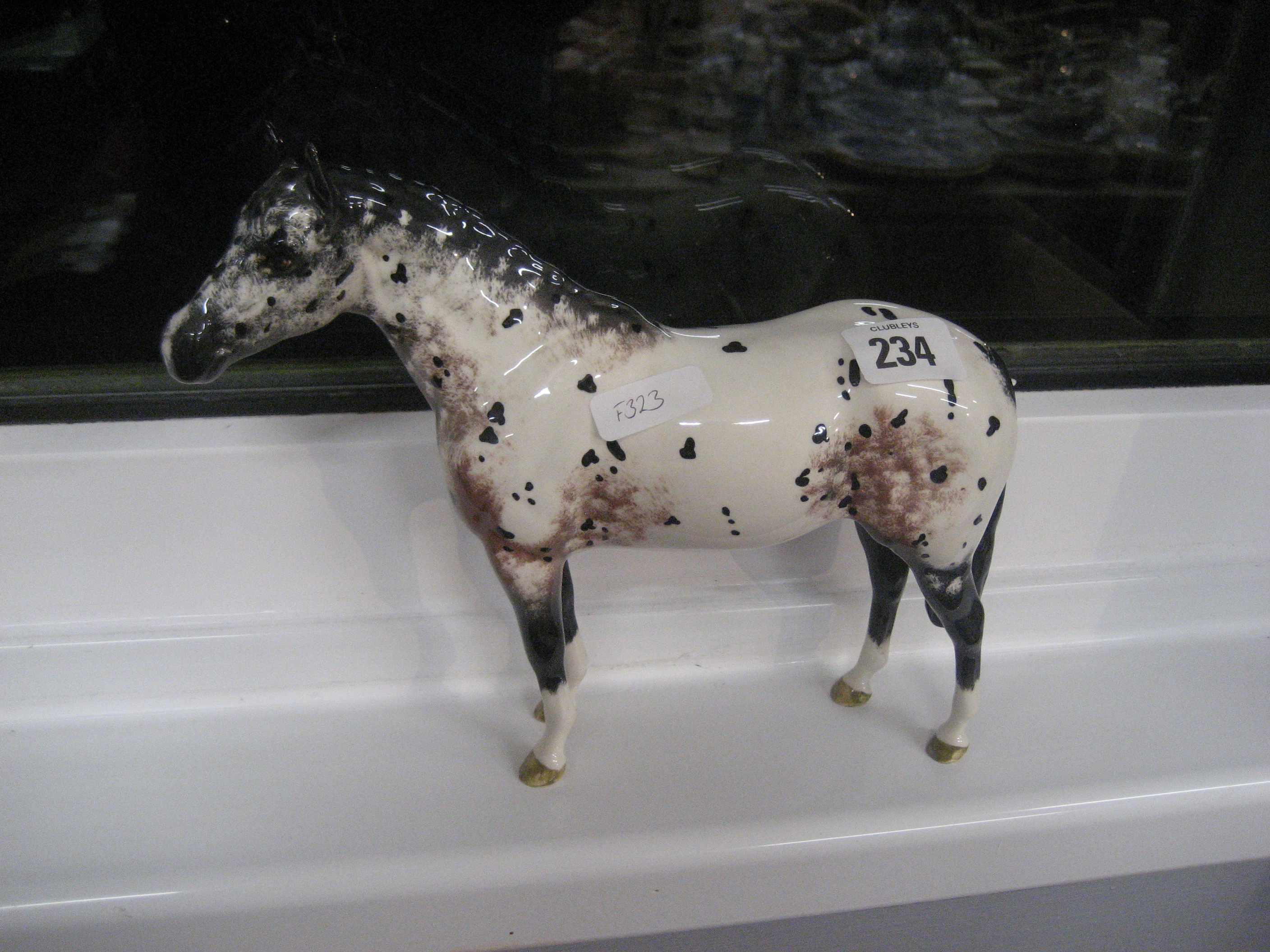 A Beswick horse.