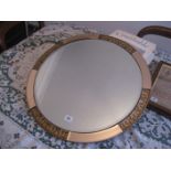 A 20th century oval mirror