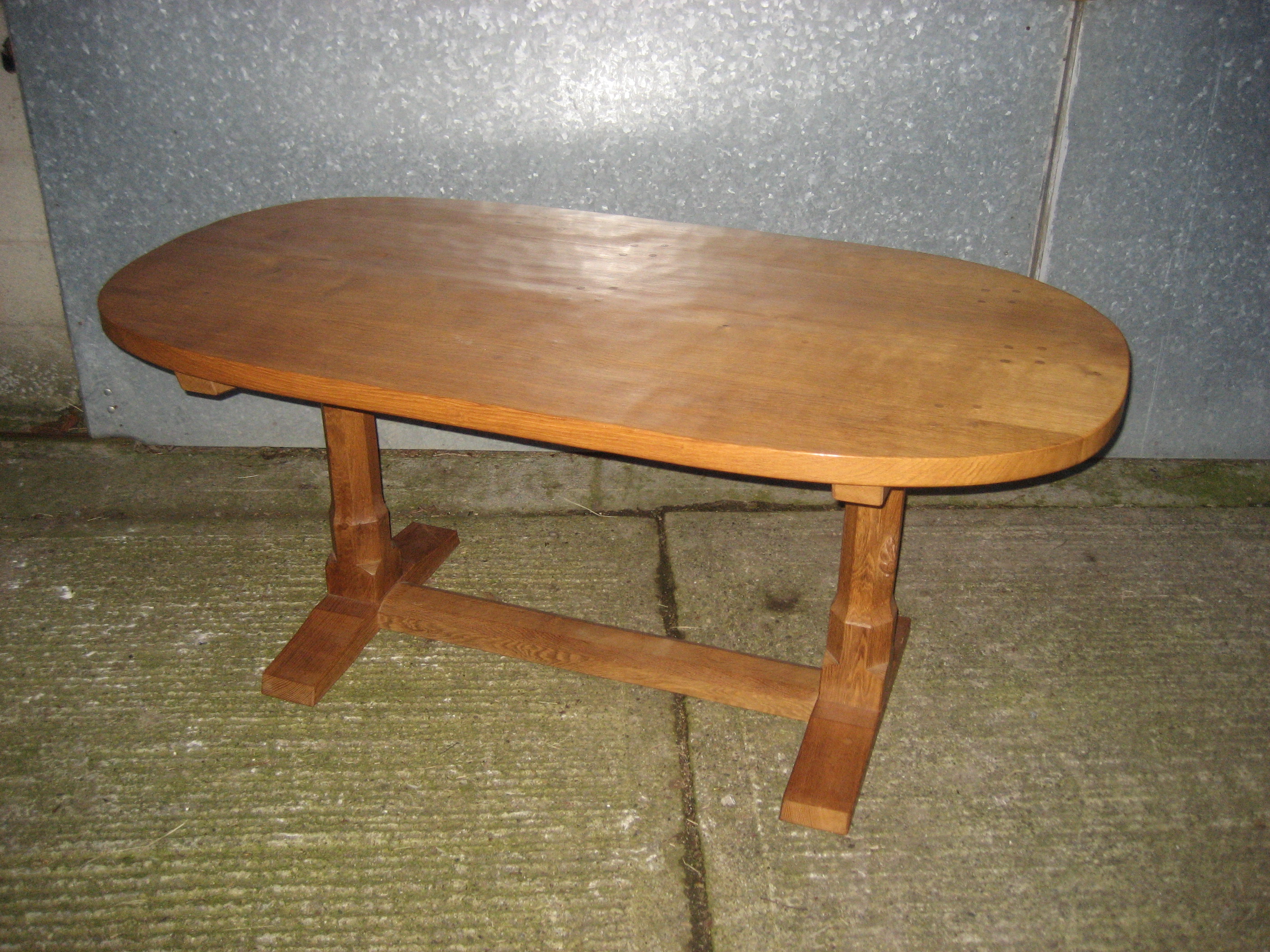 A Peter Heap oak dining table of oval from with large signature rabbit to one leg. Adzed top. - Image 2 of 5