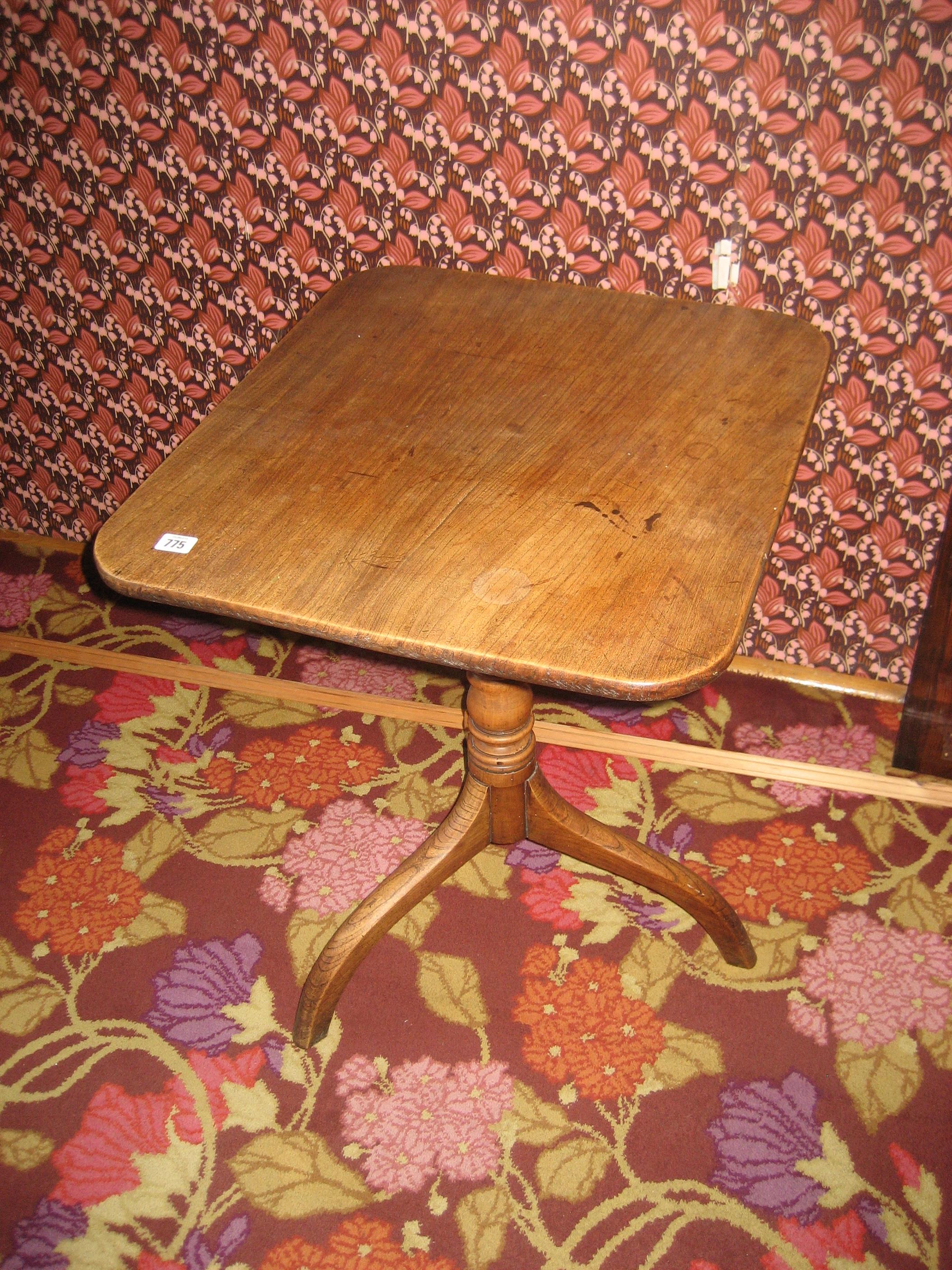 A 19th century tilt top mahogany side table.