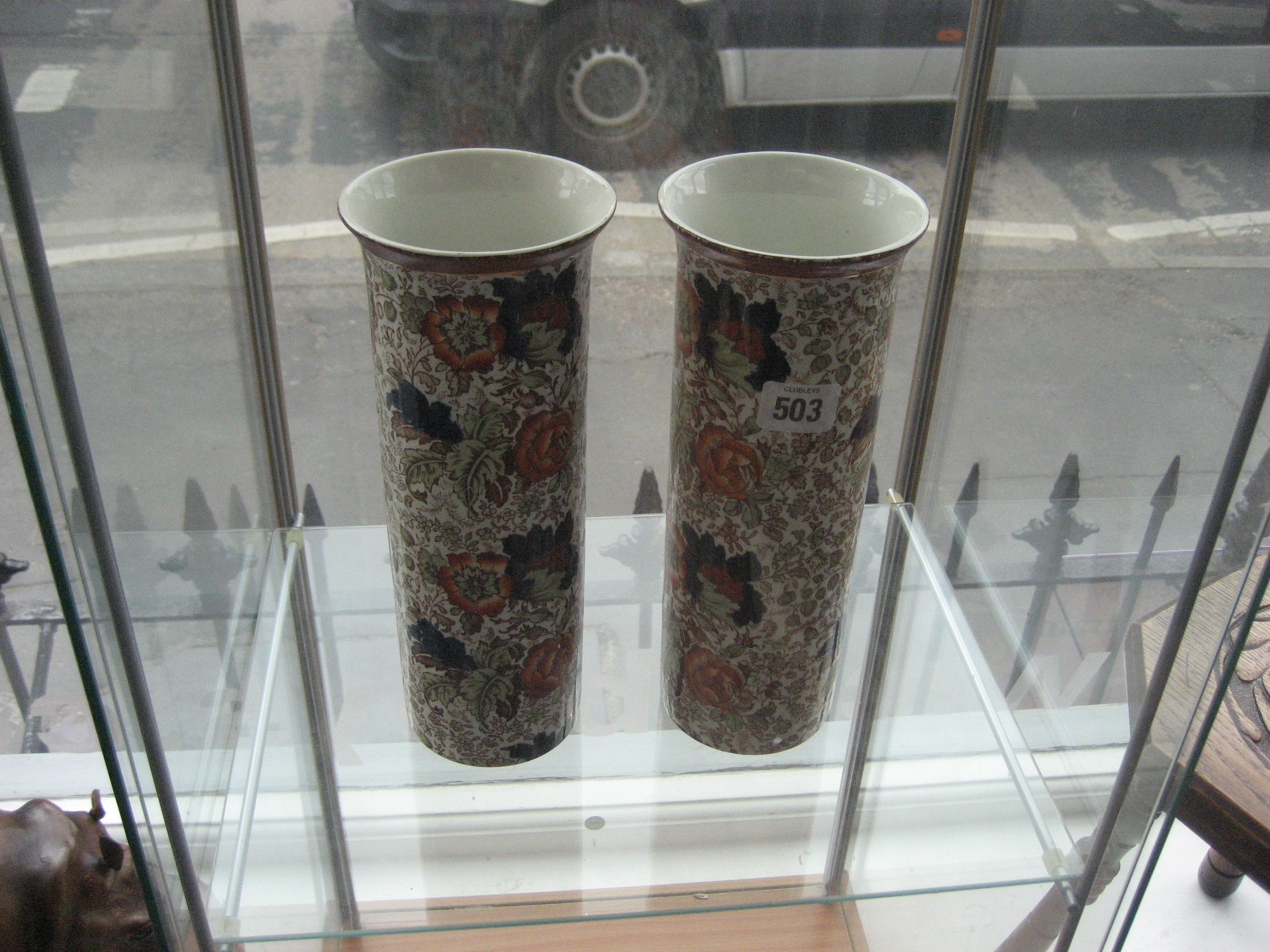 A PAIR OF EARLY 20th TRANSFER PRINTED VASES.