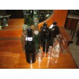 COLLECTION OF GLASS BOTTLES