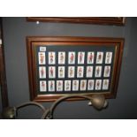 FRAMED COLLECTION OF CIGARETTE CARDS