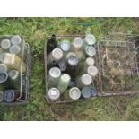 VARIOUS GLASS BOTTLES IN METAL CRATE