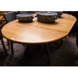 KEITH MOSSE SOLID OAK EXTENDING DINING TABLE. ROUND 110 DIAM .