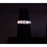 18CT WHITE GOLD GRADUATED 5 STONE DIAMOND RING