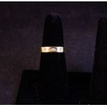 18 CT GOLD AND DIAMOND RING