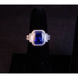 18CT WHITE GOLD SAPPHIRE + DIAMOND CLUSTER RING SET WITH BAGUETTE DIAMONDS