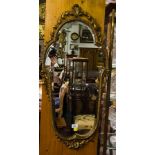 ORNATE METAL FRAMED SHAPED MIRROR